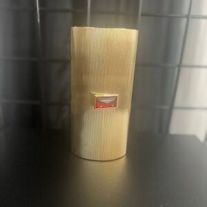 Ribbed Gold evening purse with faux ruby closure ESTEE’ LAUDER